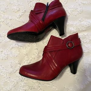 Born, size 10, red booties! Only worn twice due to knee surgery